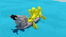 a stuffed bunny wearing a top hat is standing on a yellow object in the water