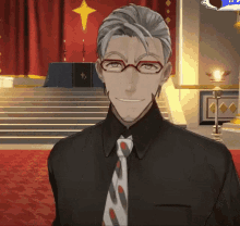 a man wearing glasses and a tie is smiling in front of stairs