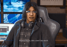 a man wearing headphones says anyway please take a seat if you would in a video game
