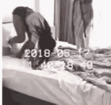 Emilly Tumbling GIF - Emilly Tumbling Playing On Bed GIFs