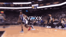 a blurry picture of a basketball game with the name kyzixx written on the bottom