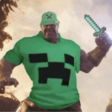 thanos is wearing a green t-shirt and holding a sword .