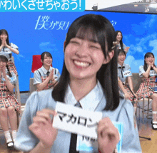 a girl with a name tag that says tvn on it