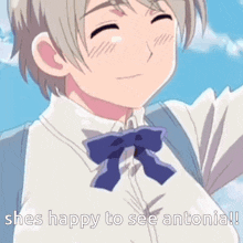a girl with a blue bow tie is smiling and says she 's happy to see antonia !