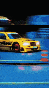 a yellow car with the word markt on the side