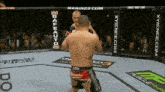 a man in a boxing ring with a safe auto sign