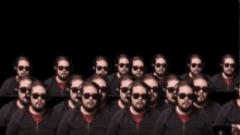a group of men wearing headphones and sunglasses .