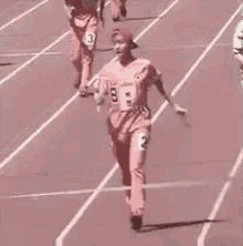 runner crossing the finish line funny
