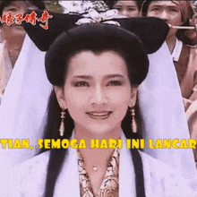 a woman in a white dress with the words tian semoga hari ini lancar on the bottom right