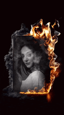 a black and white photo of a woman is surrounded by flames and the name sahren