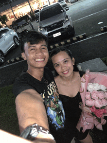 a man wearing a t-shirt that says " i can use " poses with a woman