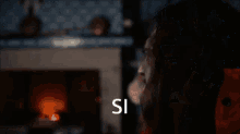 a man and a woman are standing next to each other with the word si in the corner