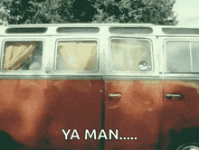 a red and white van with the words ya man written on the side