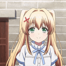 a girl with blonde hair and green eyes has a red cross in her hair