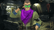a man wearing a green goggles and a purple scarf with the number 8 on it