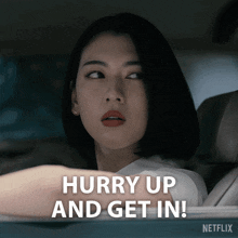 a woman in a car with the words hurry up and get in behind her