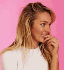 Victorias Secret Candice Swanepoel GIF - Victorias Secret Candice Swanepoel Biting Nails GIFs