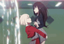 two anime girls are standing next to each other