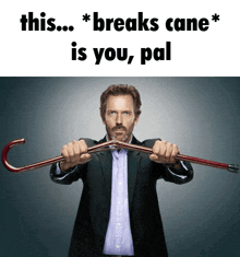a man in a suit is holding a cane in his hands and says this breaks cane is you pal .