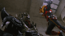 a blurred image of a person riding a roller coaster with a red shield on the back