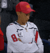 a person wearing a tiktok jersey with the number 8 on it