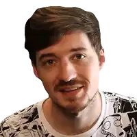 a man with a beard is wearing a cartoon t-shirt