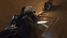 a man in a black helmet is holding a hammer