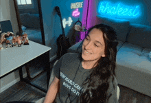 a woman wearing a t-shirt that says how hard can it boys do it