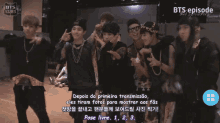 a group of young men are standing in front of a screen that says ' bts episode '