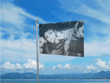 a black and white flag with a picture of a man and woman on it