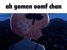a picture of a girl with flowers in her hair and the words ah gomen oomf chan above her