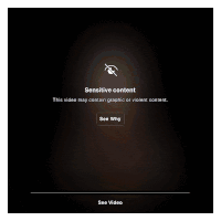a sensitive content warning is displayed on a video