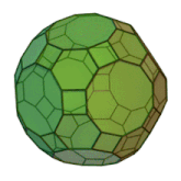 a green and brown ball with a geometric pattern