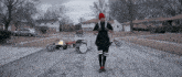 a man stands in front of a drum set that says twenty one pilots on it
