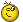 a close up of a yellow smiley face with a bee on it 's head .