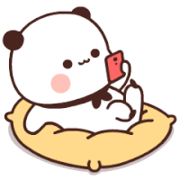 a panda bear is laying on a pillow holding a red cell phone .