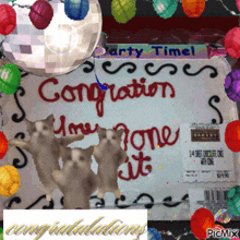 a cake that says congratulations on it with a disco ball in the background