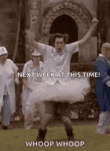 a man in a tutu is dancing in front of a group of people and says `` next week at this time ! ''
