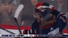a hockey game is being played between kyle connor and toronto maple leafs
