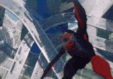 a man in a superhero suit is flying through the air