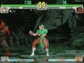 chun li and gouki are fighting in a video game with the numbers 1700 and 99 on the screen