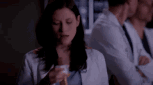 Greys Anatomy Lexie Grey GIF - Greys Anatomy Lexie Grey Eating Chocolate Bar GIFs