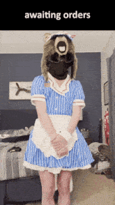 a person in a maid costume with the words awaiting orders on the bottom