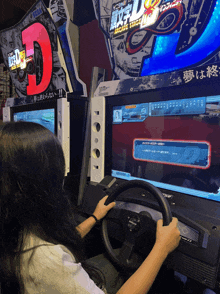 a woman is playing a video game called arcade stage