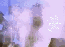 a statue of jesus is standing in the middle of a foggy cave .