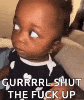 a baby girl is making a funny face and says gurrrl shut the fuck up .