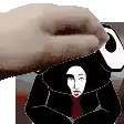 a hand is putting a picture of a man on top of a picture of a woman .