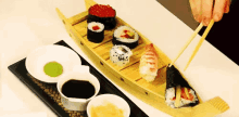Sushi Boat GIF - Sushi Japanesefood Californiaroll GIFs