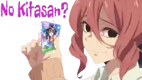 a girl with red hair is holding a ssr card