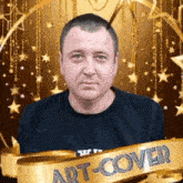 a man is standing in front of a gold banner that says art cover